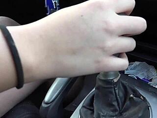 brunette drives manual stick shift completely barefoot outdoors