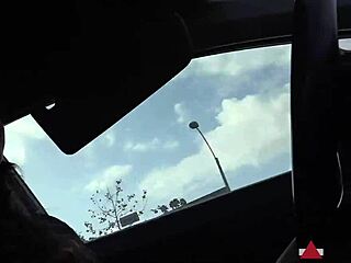 brunette drives manual stick shift completely barefoot outdoors