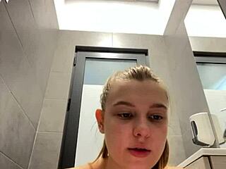 Horny teen with big ass and tits squirts hard in changing room mirror