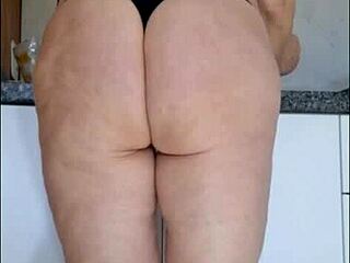 😍 hidden cam catches stepmom in see-thru top and panties kitchen tease! 🔥