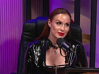 is this redhead milf the ultimate bdsm domme queen in latex?