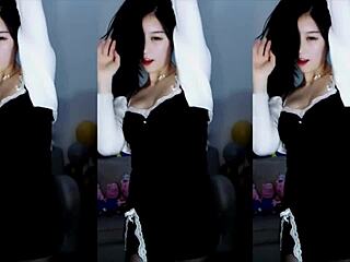 cute chinese girl dances sexy