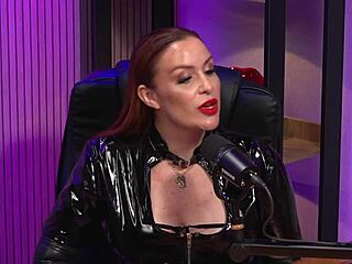 is this redhead milf the ultimate bdsm domme queen in latex?