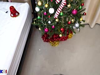 asian milf wife slurps interracial cock under christmas tree
