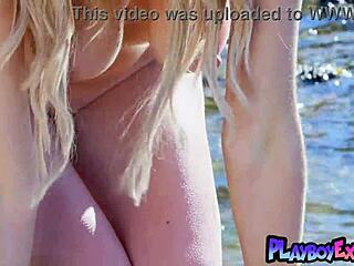 Heidi Michel bares big natural tits beach sunbath