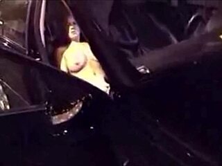 busty milf fingers pussy while driving her car