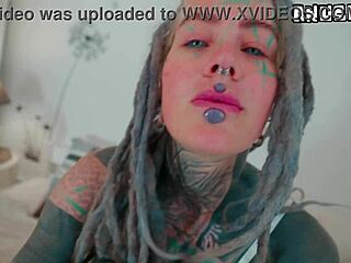 hey watch this heavily tattooed skinny goth girl with pierced nipples rip clothes and fuck herself hard missionary style with huge bedroom dildo to orgasm
