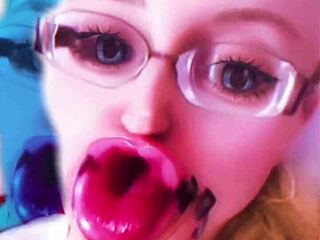 check out this dollification sissification with huge pink lips glasses fetish