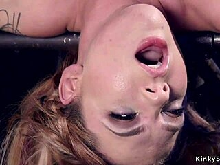 submissive babe gets whipped hard and caned while tied tight in devices. total bdsm pain play