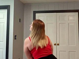 watch this brunette wife strip teasing to music with big tits