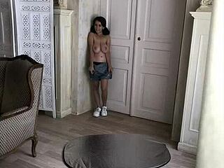 hot busty brunette poses in bra showing big natural tits tattooed