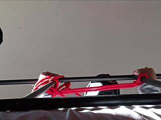 she's bound hooded gagging on cock with spit dripping down her chin.