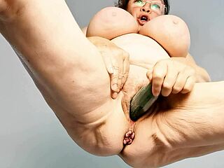 watch this busty gilf stuff banana and cucumber deep in her granny pussy!