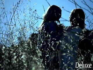 Two sexy babes finger and lick in forest