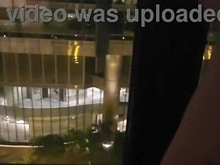 Girlfriend Fingers Clit to Orgasm in Hotel Window Public View