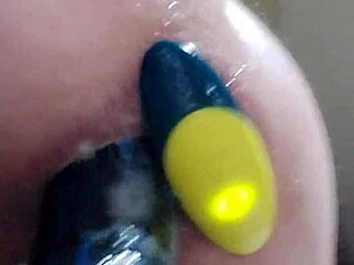 how's this slut stretching her asshole with dildo toys