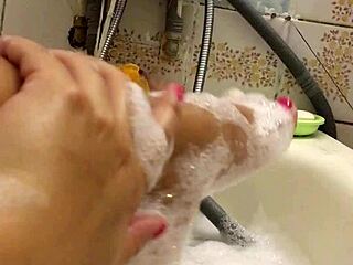 big tits beauty plays soft bath game