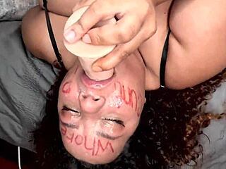bbw girl writes dirty words on her face then deepthroats dildo in humiliation play