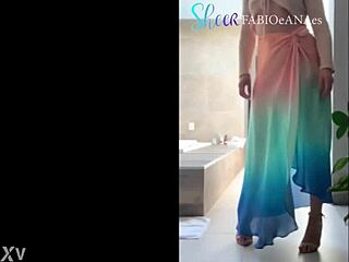 a sensual dancer sways in costume outdoors