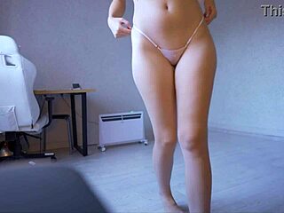 spy cam catches teen in mini bikini thong fitting tease