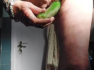 Granny rams cucumber deep in pussy!