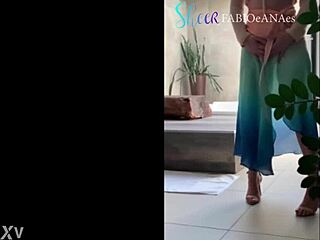 a sensual dancer sways in costume outdoors