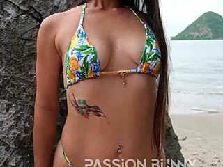 wanna see this cute bikini babe flash on the beach?