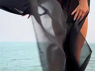 beauty chills in black dress at public art