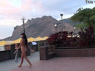 nude milf strolls naked through crowded public streets