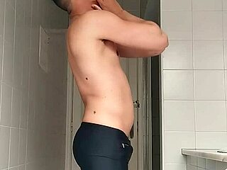yo, wanna see this sexy guy shave in black beach shorts bathroom style?