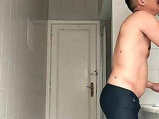 yo, wanna see this sexy guy shave in black beach shorts bathroom style?