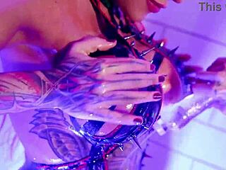 Goth sluts oil up and toy fuck in 4K shower