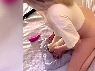 She grinds and scisses fake tits doll possessing her smooth clit pussy