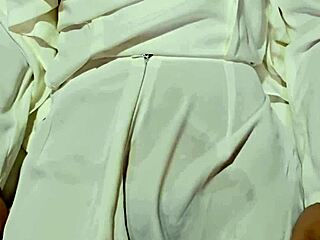 a beautiful vietnamese lady in traditional attire shows her wet hairy pussy outdoors