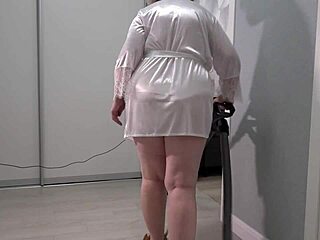 hey, check out this mature housewife's thick ass peeking under her short robe with those big boobs jiggling behind the scenes...