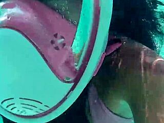 Skinny tattooed teen teases poolside with her huge cock toy