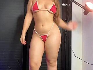blonde bombshell struts in tiny bikini paired with killer high heels