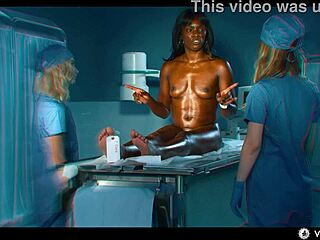 Ebon vampire master mesmerizes blonde teen slaves in Halloween lezdom threesome.