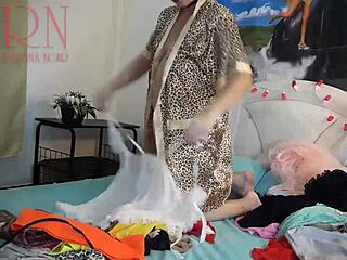 curvy housewife lays out lingerie panties on bed teasing pussy