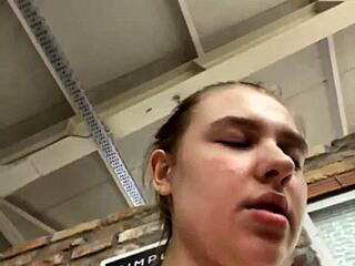 A young woman enjoys intense creampie action right in the public gym
