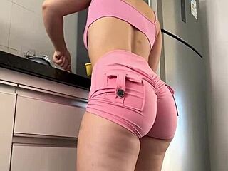 fit girl rocks pink shorts and leggings in intense full body workout routine