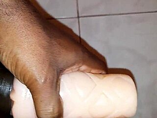 Ebony jerks monster black cock to cumshot with fleshlight toys