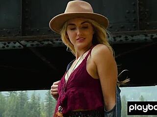 petite blonde anna katarina strips naked outdoors strumming guitar with natural tits