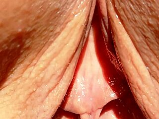 maturemom flashes her huge soaking wet meaty pussy lips in slow motion