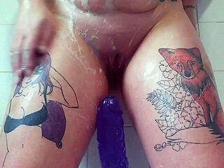 milf masturbates in bath using big purple 12-inch dildo till cum