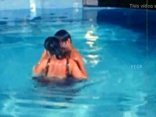 unmarried hot couple enjoying at swim pool