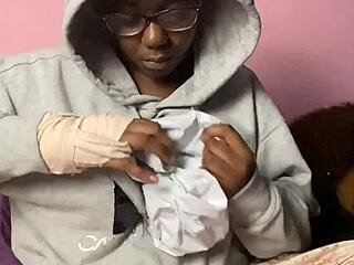 ebony webcam model unboxes a new sex toy for viewers