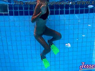 Petite asian plays plugged by the pool