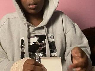ebony webcam model unboxes a new sex toy for viewers