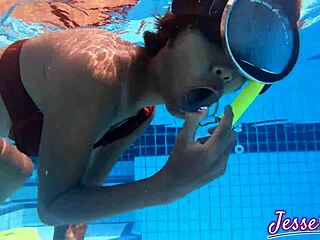 Petite asian plays plugged by the pool